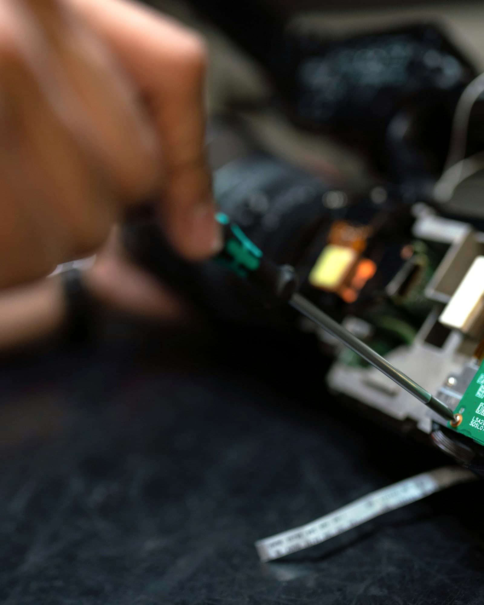 Technician servicing equipment